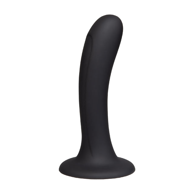 Black silicone dildo on a white background
